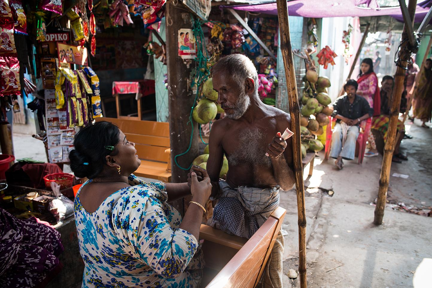 A customer bargains with a Daulatadia Brothel in Daulatadia, Rajbari, Bangladesh. Daulatadia is...