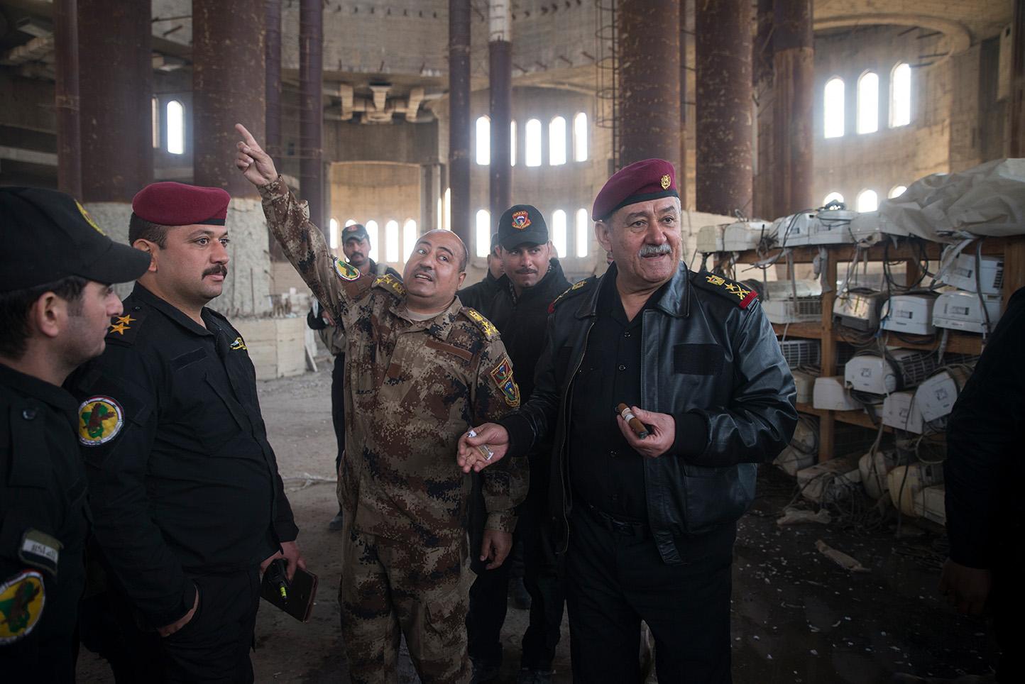Mosul, Iraq. A member of Iraq Special Forces show Abdul-Ghani al-Assadi commander of...