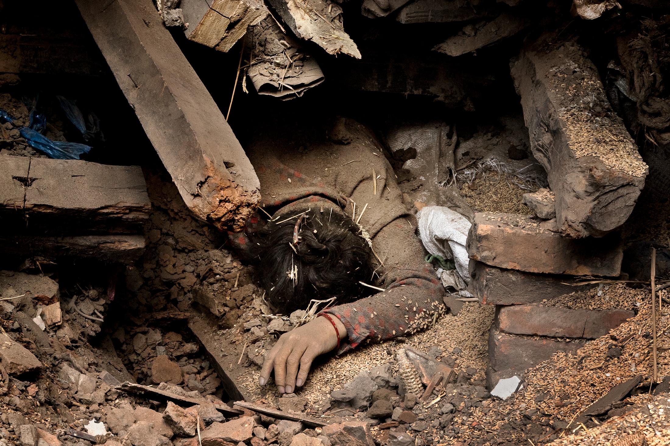 When the Earth Shook Nepal - BHAKTAPUR, NEPAL - APRIL 26: The body of one of the...