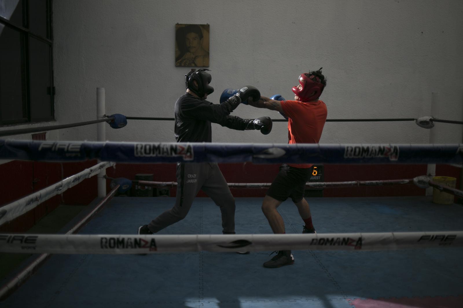 Fighterss in the ring at Romanza Gym.