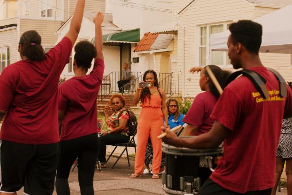 Image from Block Party for NYT - Sudan Deane takes pictures while The Berean Drumline...