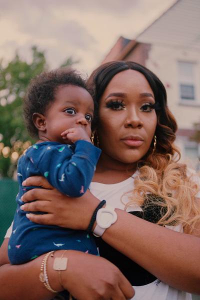 Image from Block Party for NYT - Racquel Jones with her nephew Mason Roland, 5 months,...