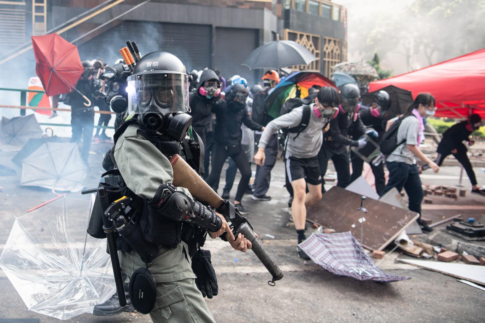 The Siege of PolyU - HONG KONG, CHINA - NOVEMBER 18: Police chase...