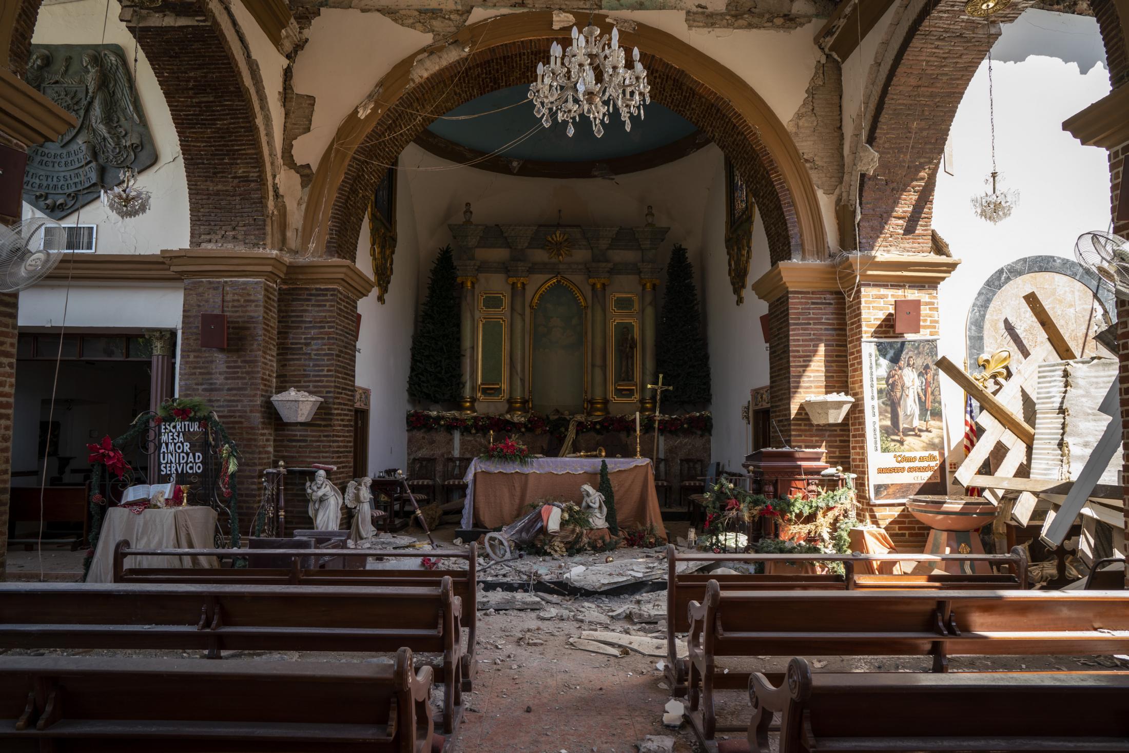 GUAYANILLA, PUERTO RICO - JANUARY 7: The father inspect damage to the church Parroquia Inmaculada Concepci&oacute;n after a 6.4 earthquake hit...