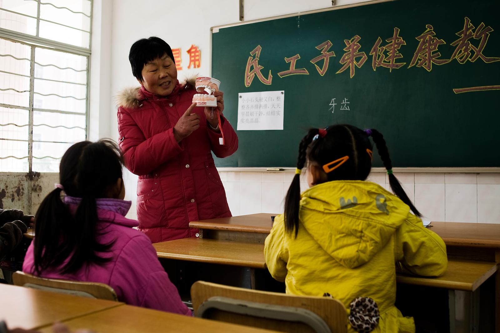Second grade students in a dent...i. Shanghai, China January 2009