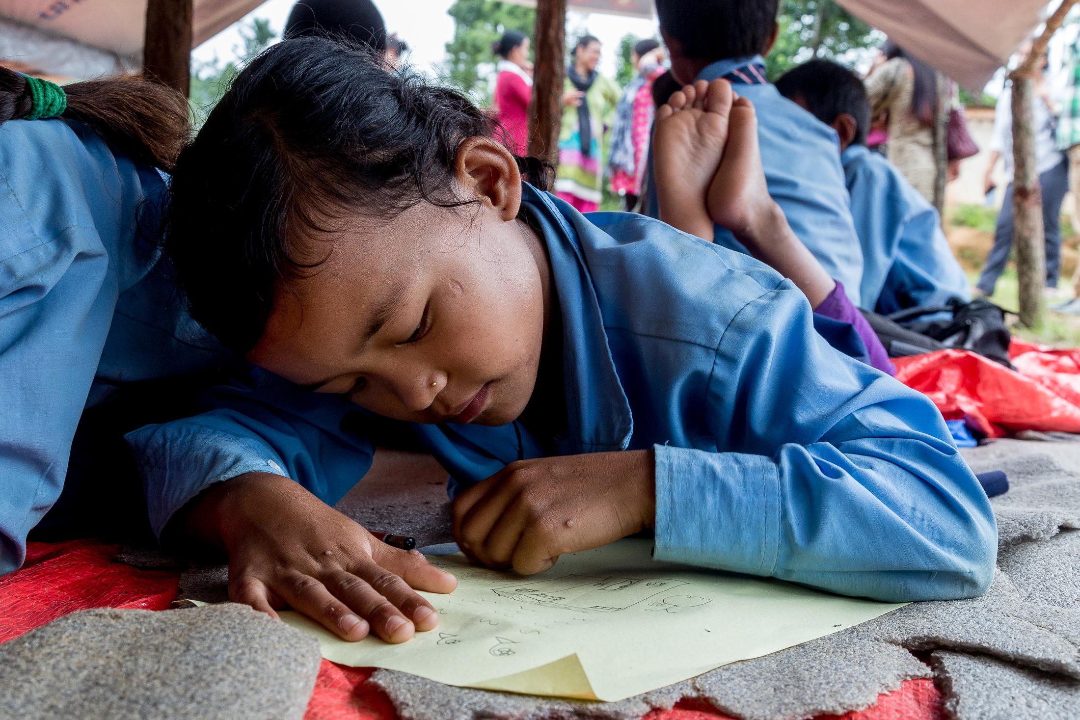 Portfolio NGO - DHULIKHEL, NEPAL - AUGUST 07, 2015: Children attend a...