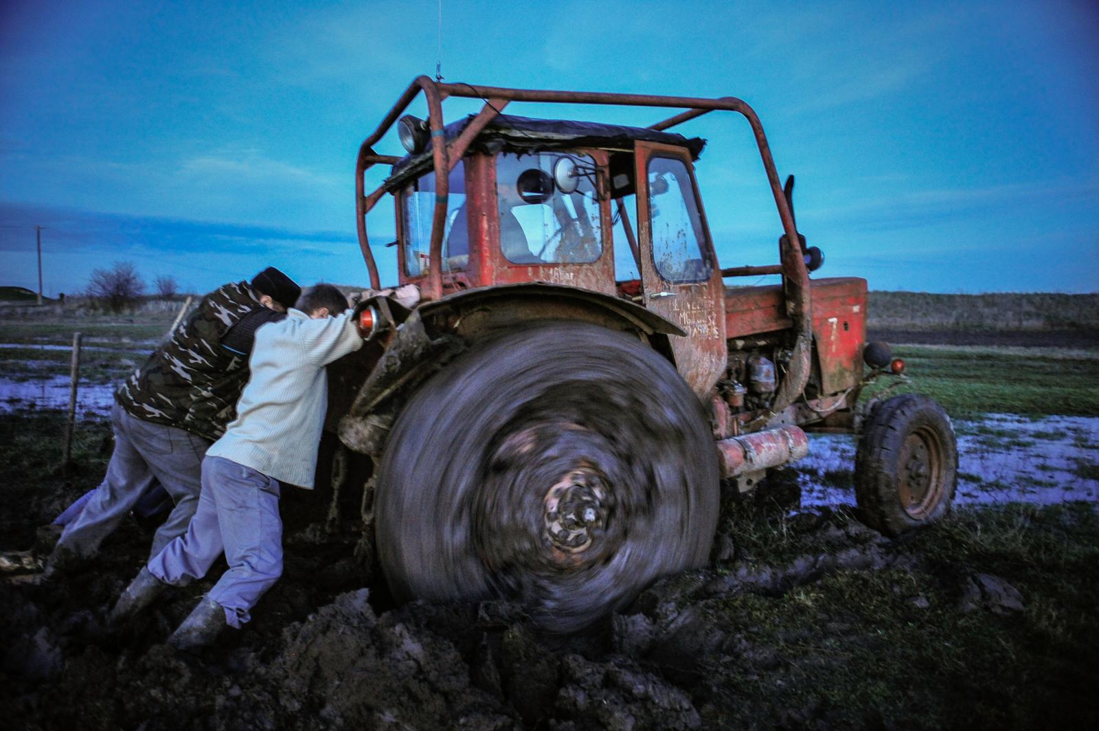 A tractor stuck in mud at the &...ungarian village of Csanytelek.
