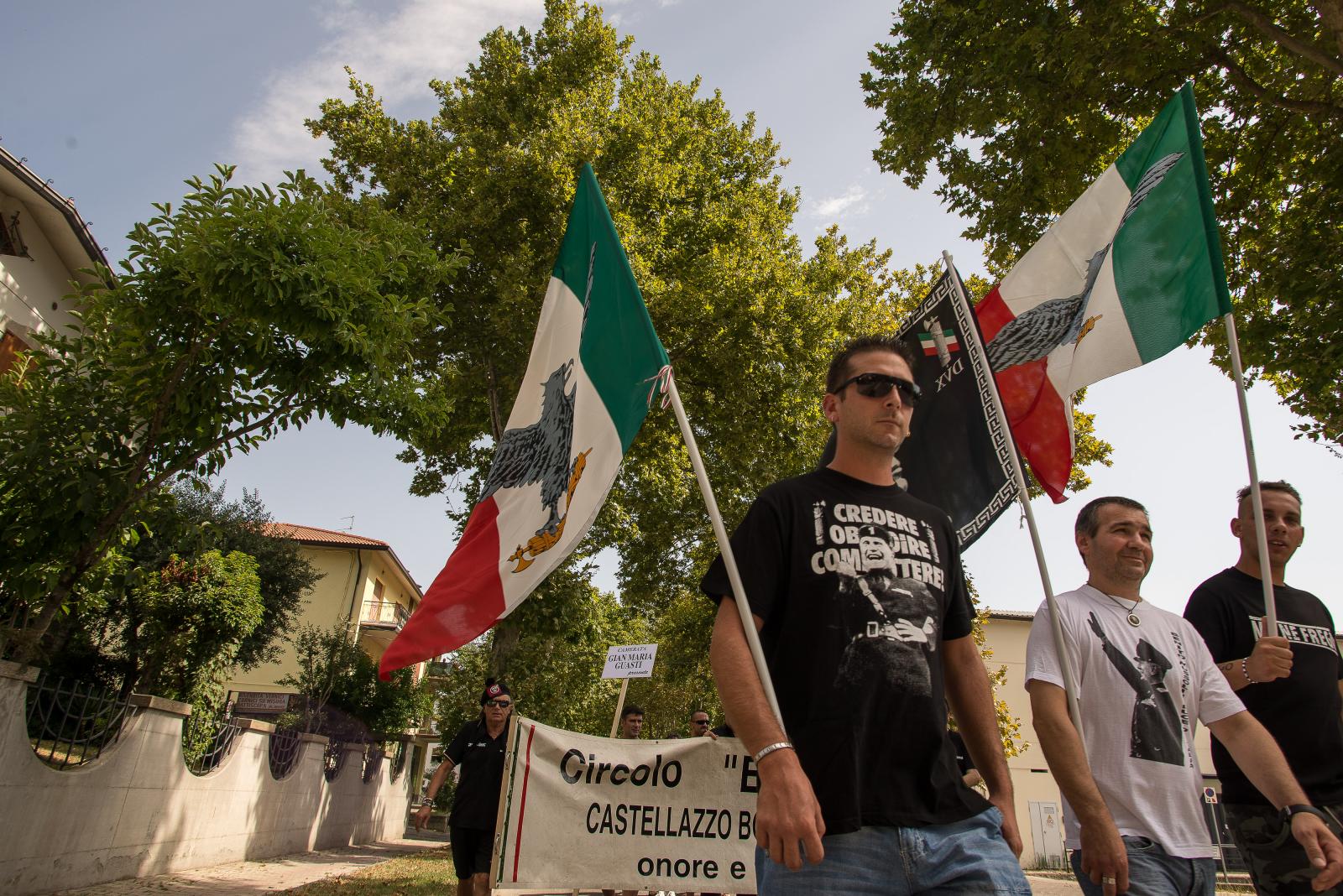 Neo Fascist carrying Italian fl...h symbols of the fascist regime
