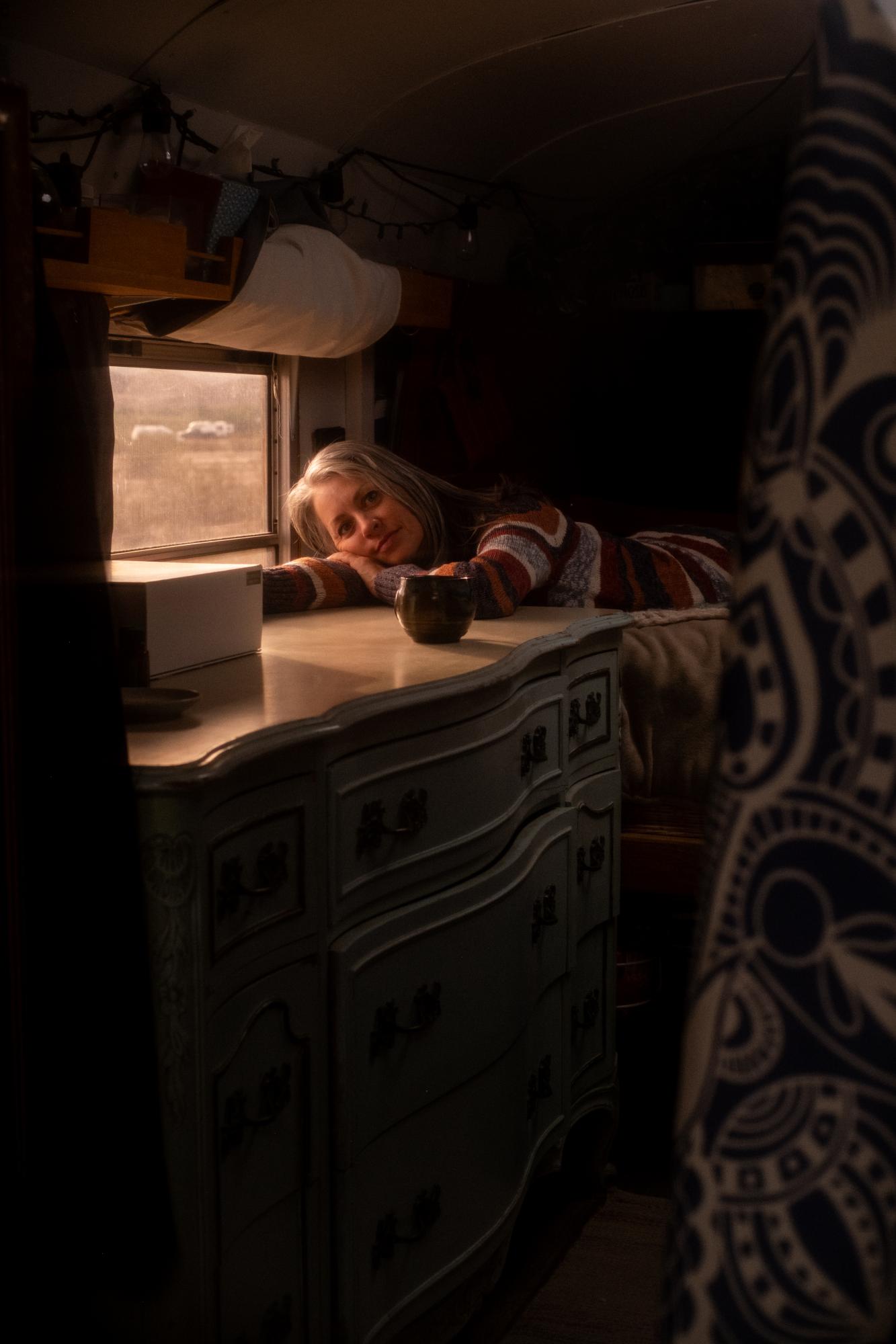 A Warm Winter (An Ongoing Journey) - A portrait of Catherine inside her rig. Quartzsite, Arizona.