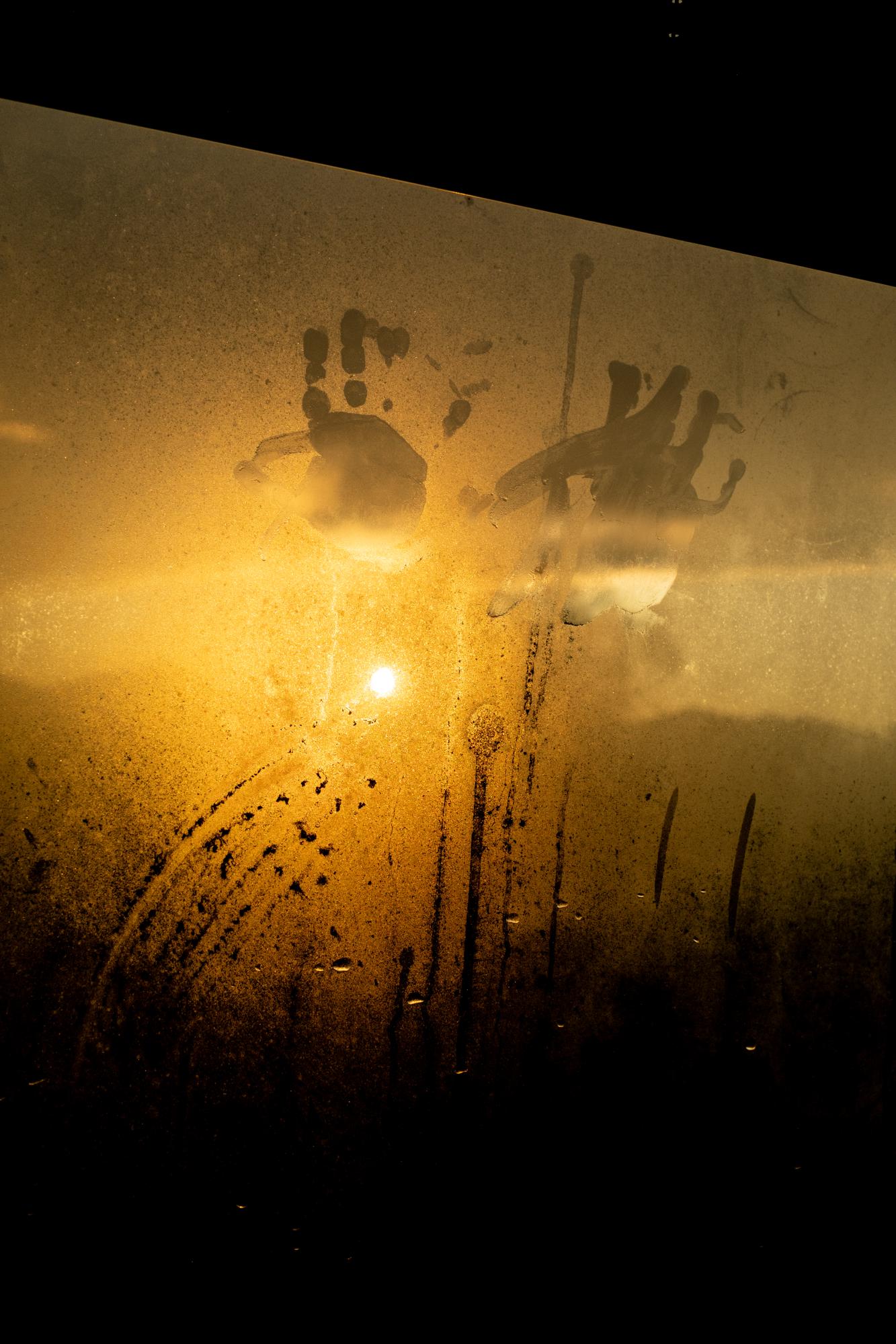 A Warm Winter (An Ongoing Journey) - Nilde's handprints on our window. Quartzsite, Arizona.