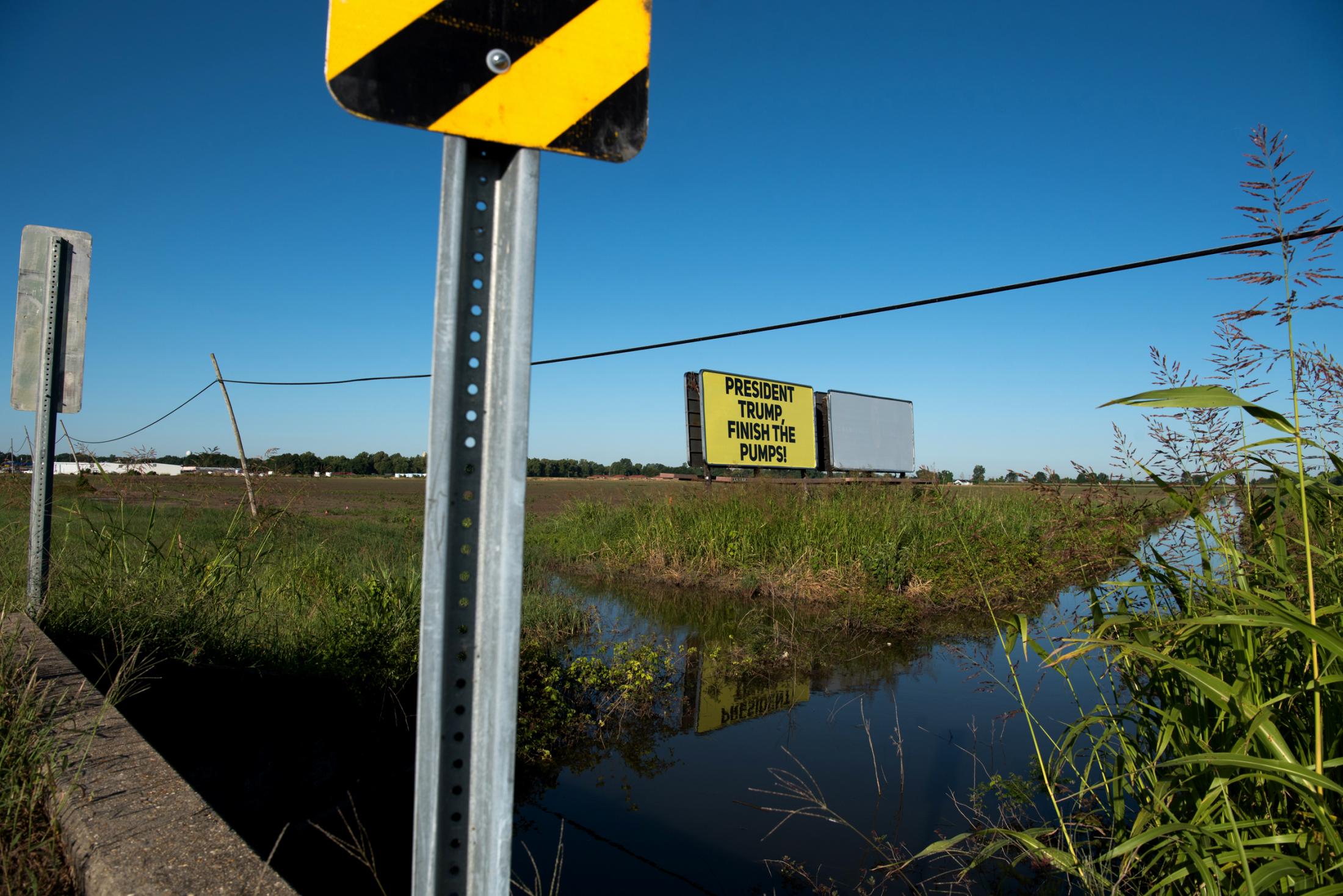 Flood of Biblical Proportions - A billboard in Rolling Fork, Mississippi urges President...
