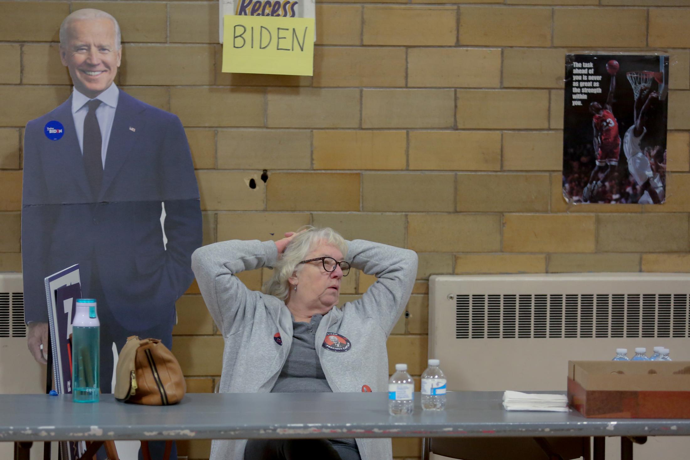 Iowa Caucus 2020 - Joe Biden supporter Priscilla Nelson leans back in her...