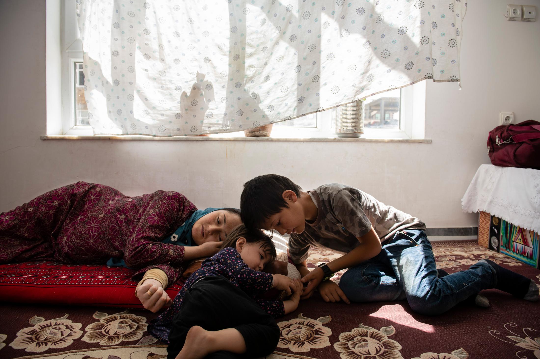 KABUL | AFGHANISTAN | 8/3/18 | As Rahila's contractions speed up, her daughter, Sofia (2), starts comprehending that her mother is in pain and...