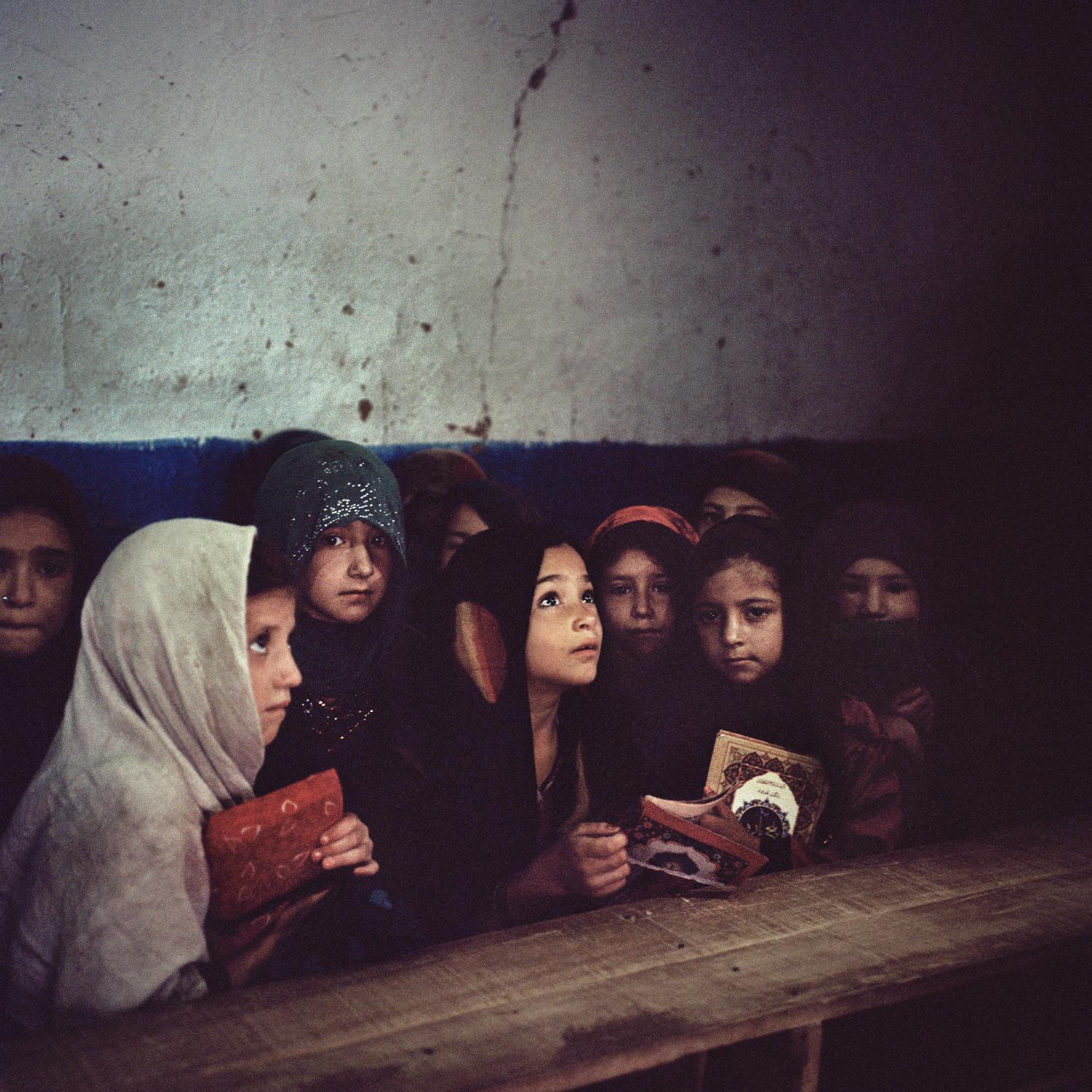 Single images - Girls at an Afghan refugee settlement on the outskirts of...