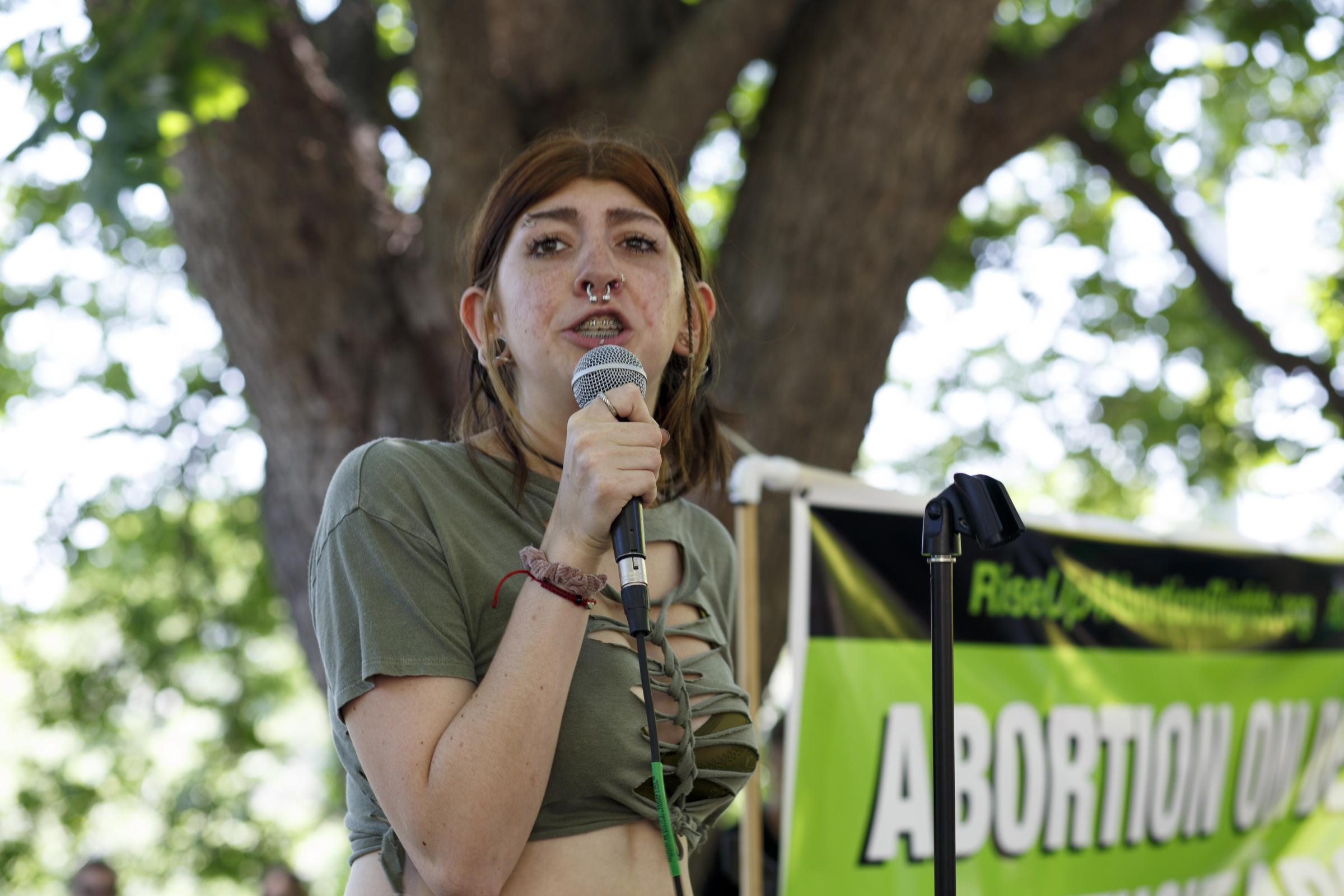 Abortion Rights Protest Austin Texas - Abortion Rights activist Zoe speaks to the gatering at Buford Tower on Cesar Chavez Street in...