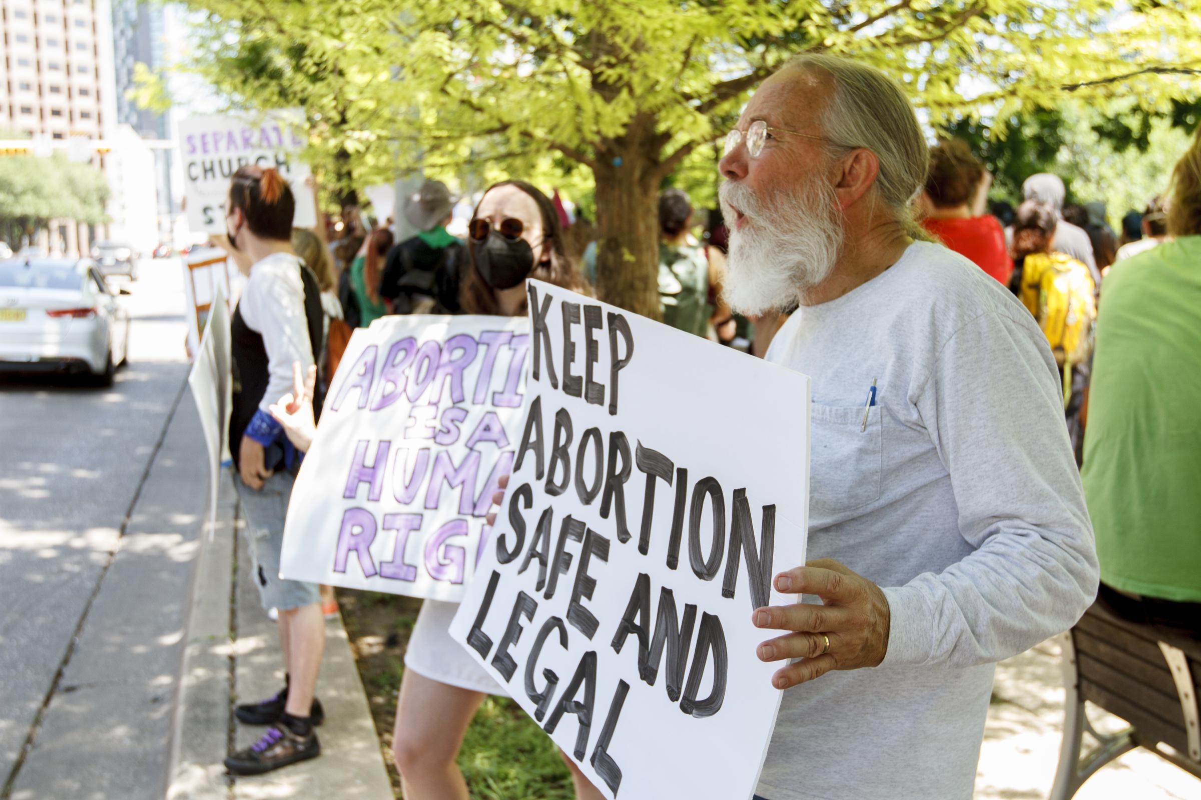 Abortion Rights Protest Austin Texas - Abortion Rights protestors gather at Buford Tower on Cesar Chavez Street in Austin Texas to...