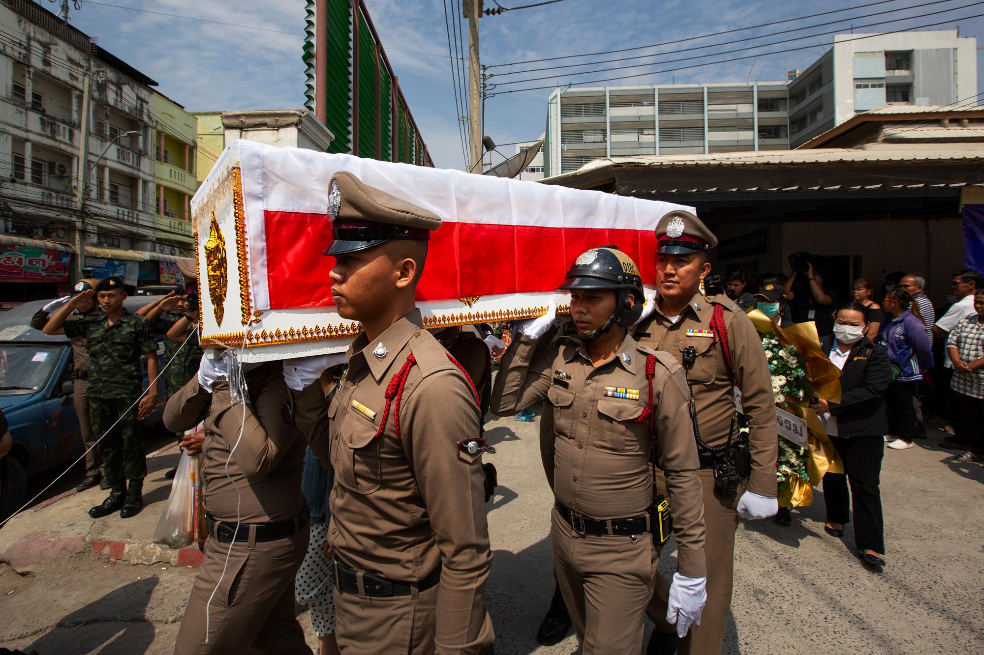 A funeral procession for police sergeant, Chatchawal Thaengthong, who was killed while responding to the mass shooting perpetrated by Seargent...