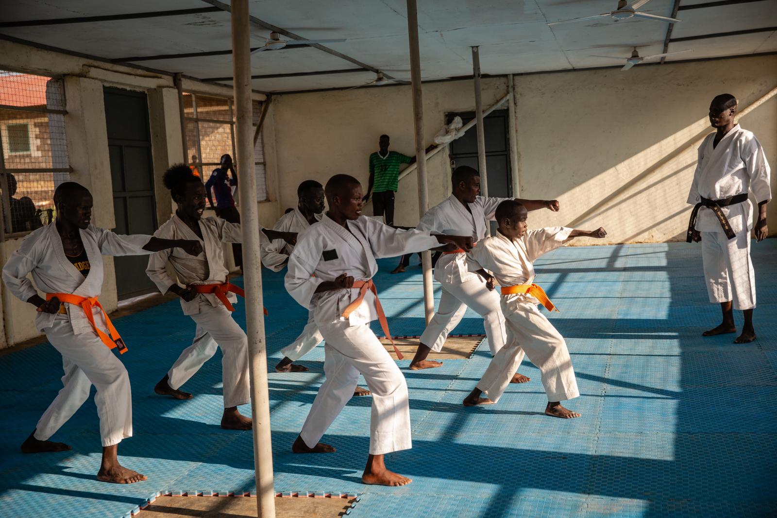  Karate students practice at Ha...school and in school holidays. 