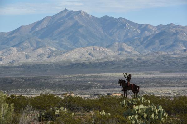 Apache tribe marches to protect sacred Arizona site from copper mine