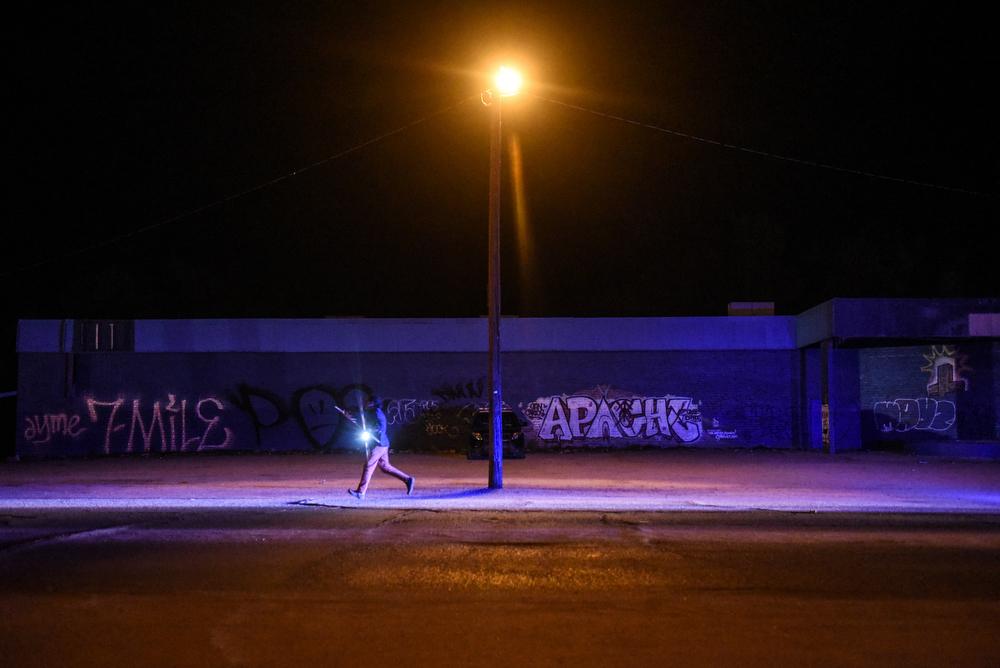 Aaron J. Sender runs his leg of...hange. REUTERS/Stephanie Keith 