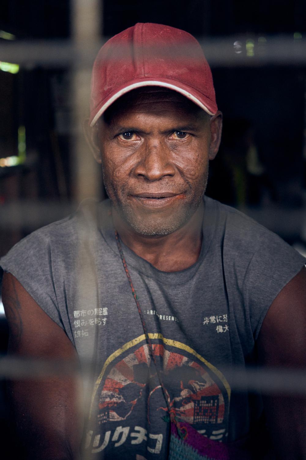 IFAD Photo Mission 2019 - Robert Maeobia, coconut oil processing worker and coconut...