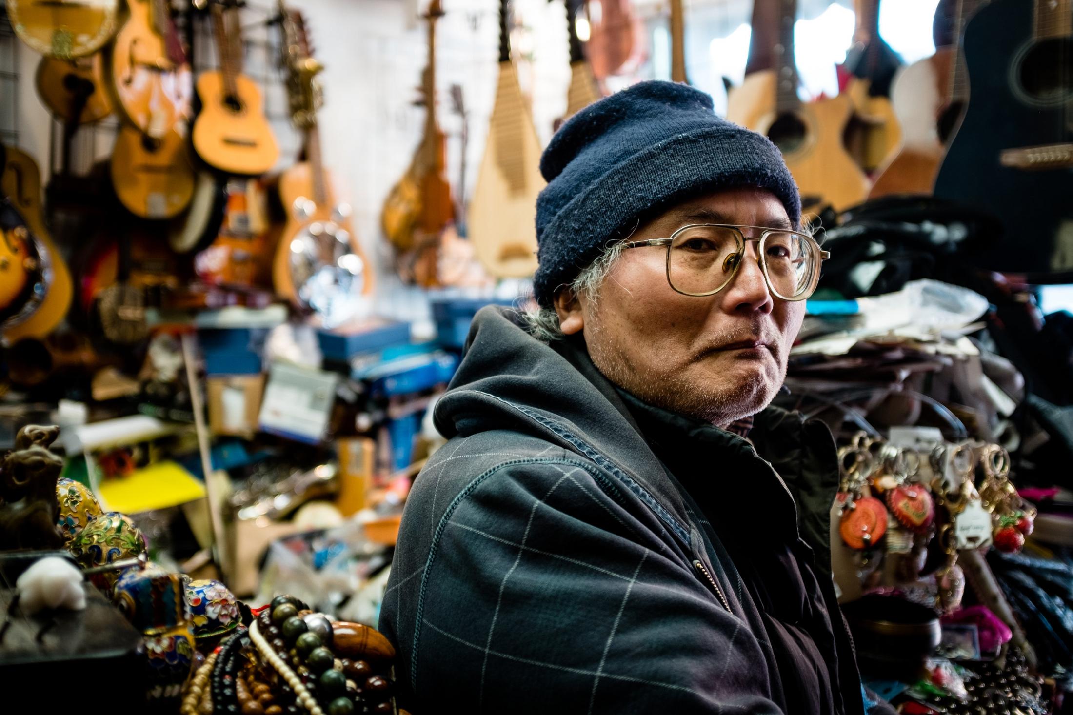 People - An unknown store owner in Torontos Chinatown. 