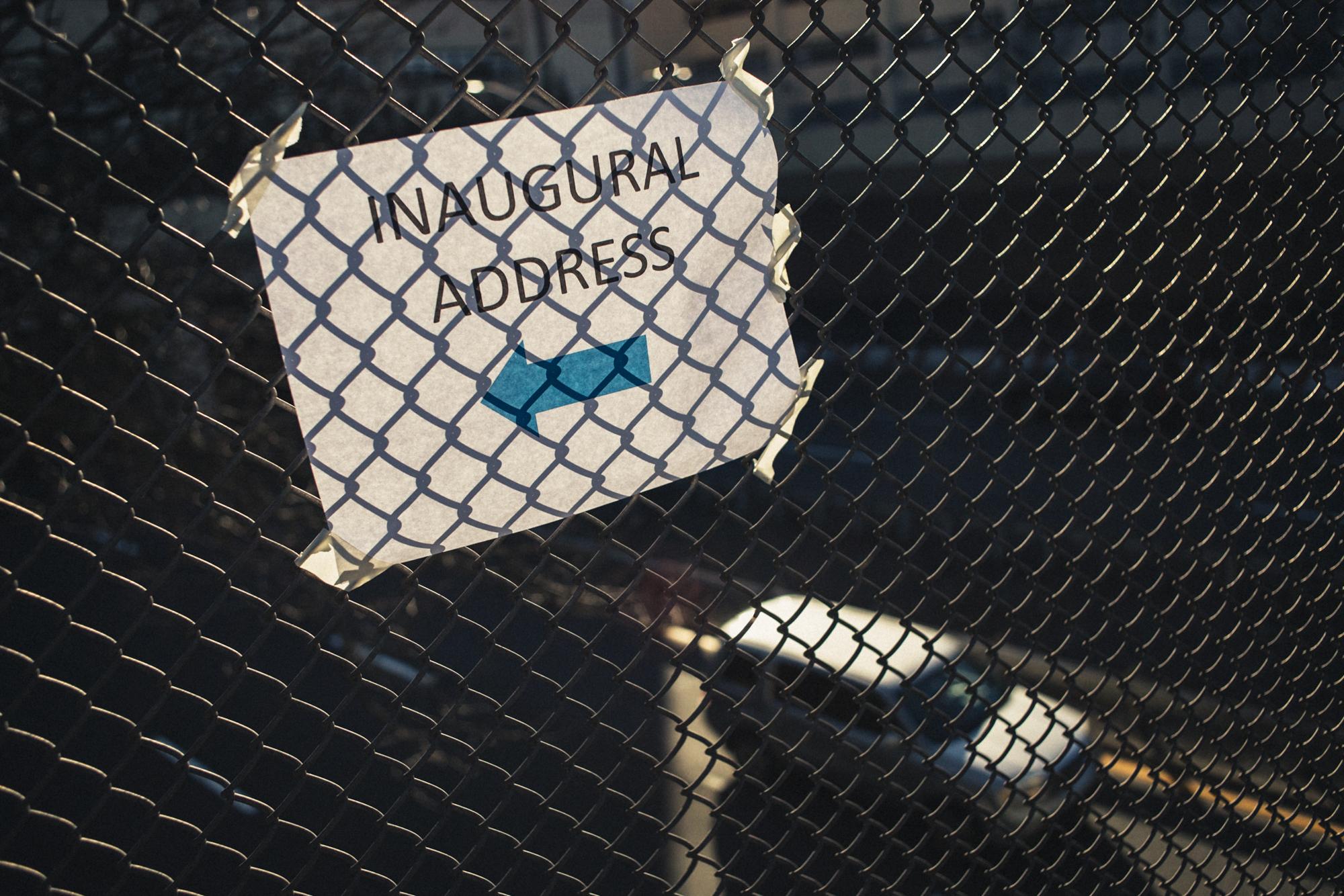 Soap Box in the Bronx - A sign sits taped onto a chain-link fence directing...