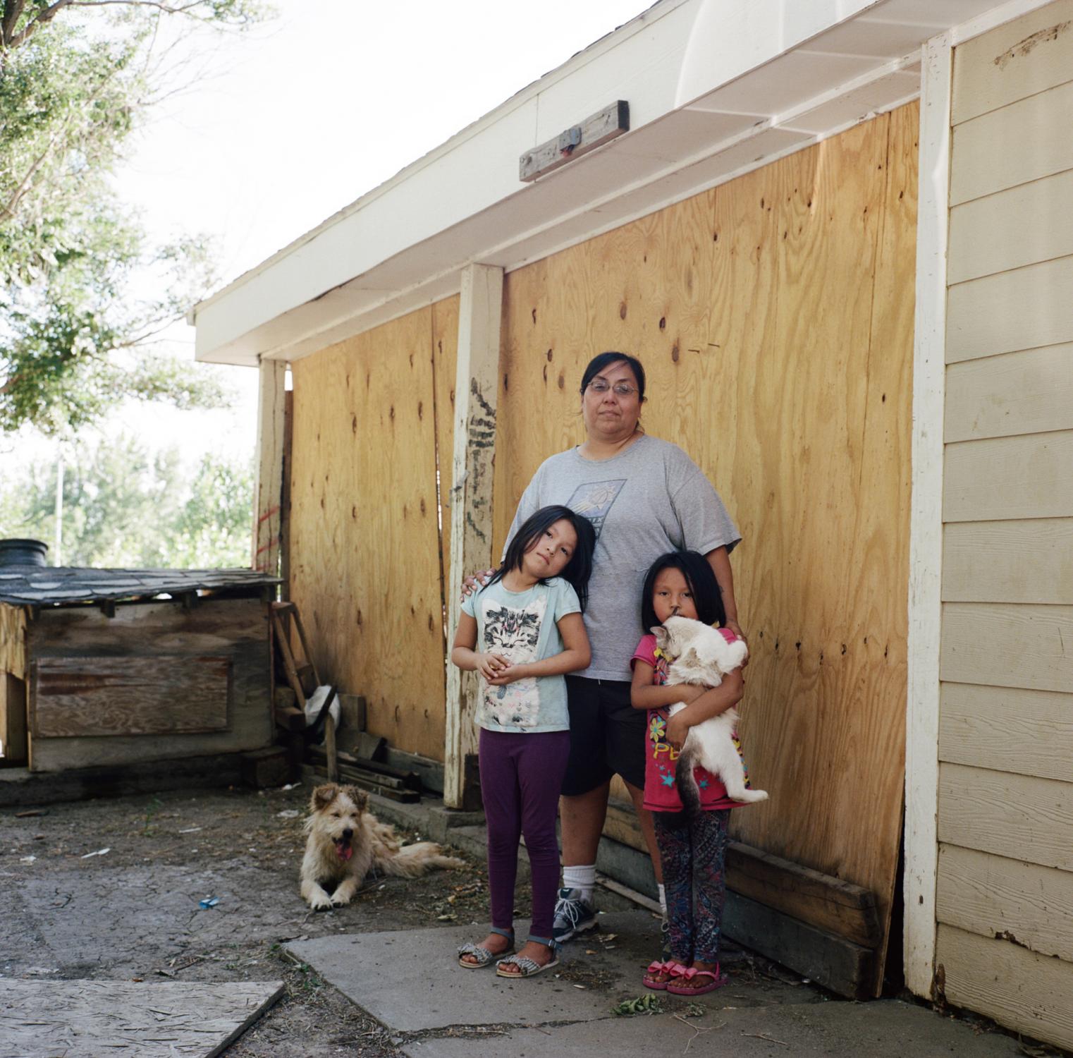 The Bakken oil shale's impact on Native American women - Tara Douglas Ricker, 44, with her two grand-daughters...