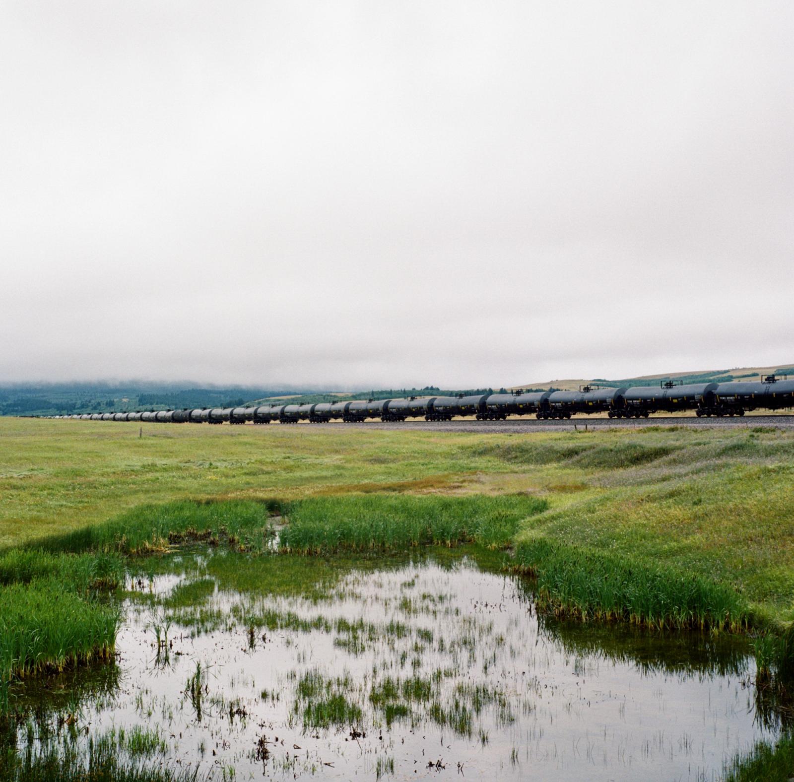 The Bakken oil shale's impact on Native American women - A freight train carrying crude oil travels through...