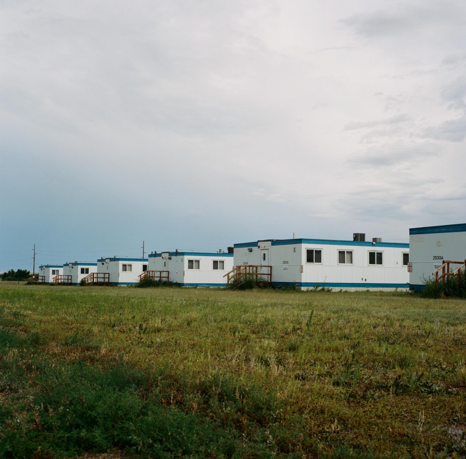 The Bakken oil shale's impact on Native American women - An abandoned “man camp” which provides...
