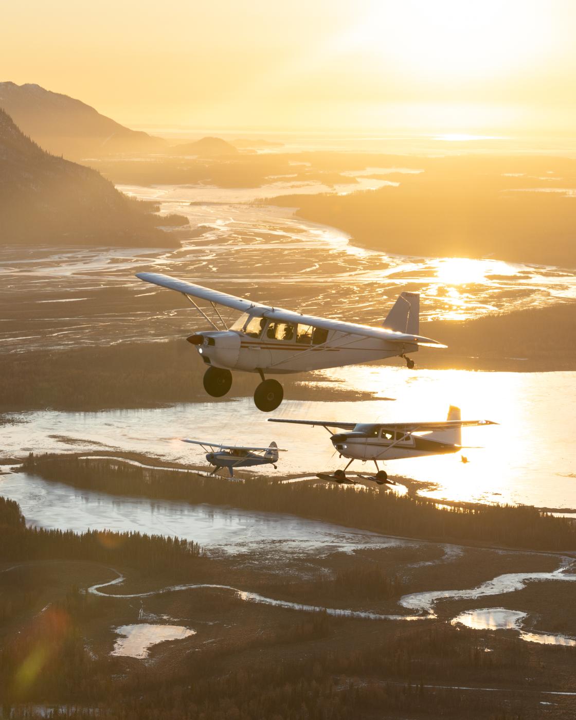 Pilots fly in formation down th... from more experienced friends.