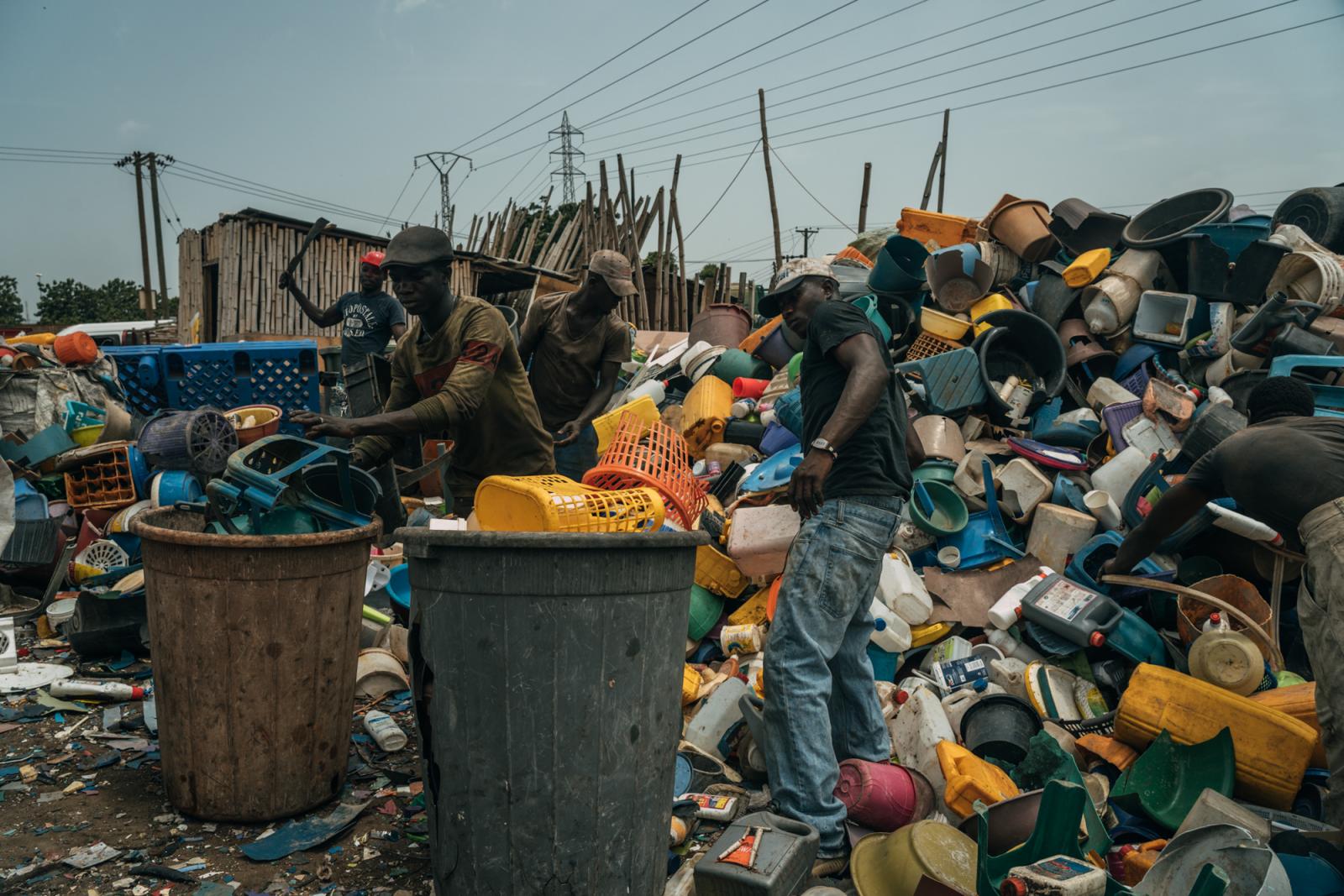 Workers at Accra waste manageme...or AP Bloomberg Philanthropies.