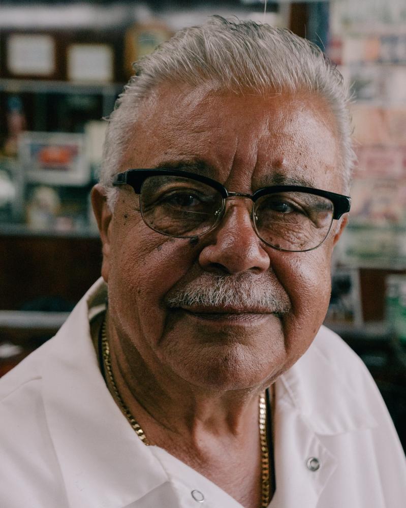 Eladio Burgos, 77, sits for a p...oklyn borough of New York City.