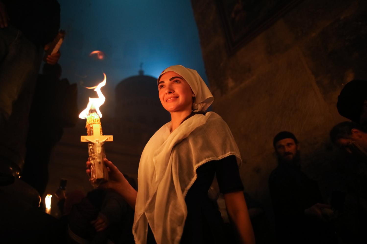 Christian Orthodox worshippers ...her side of the Holy Sepulchre.