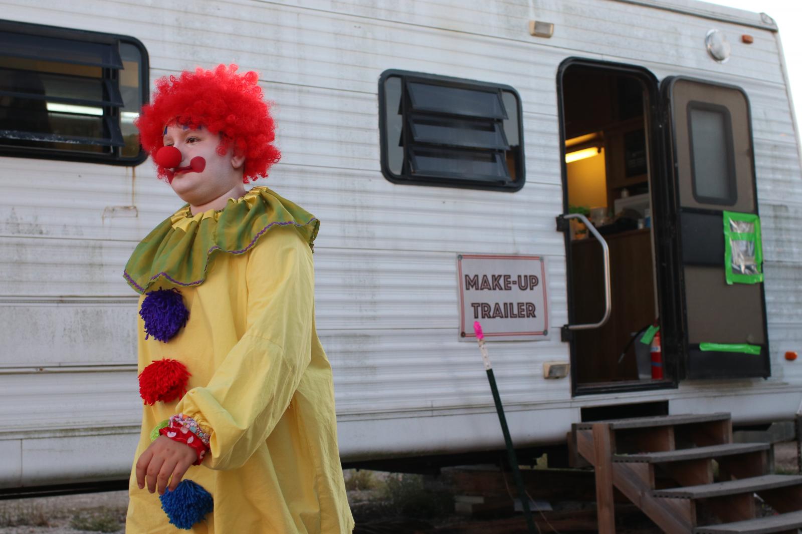 &nbsp;A clown leaves the ma...s position before the pre-show.