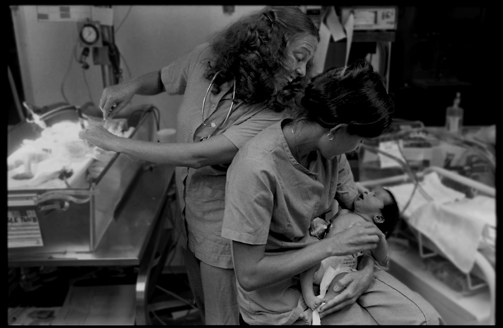 Besides physical care giving, nurses on Neonatal Intensive Care Unit (NICU) often show tenderness. University of Arizona Health Science Center NICU. Tucson, AZ, USA.