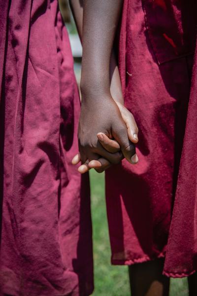Image from Photography - School girls hold hands.  For VOW / Girl First Fund 