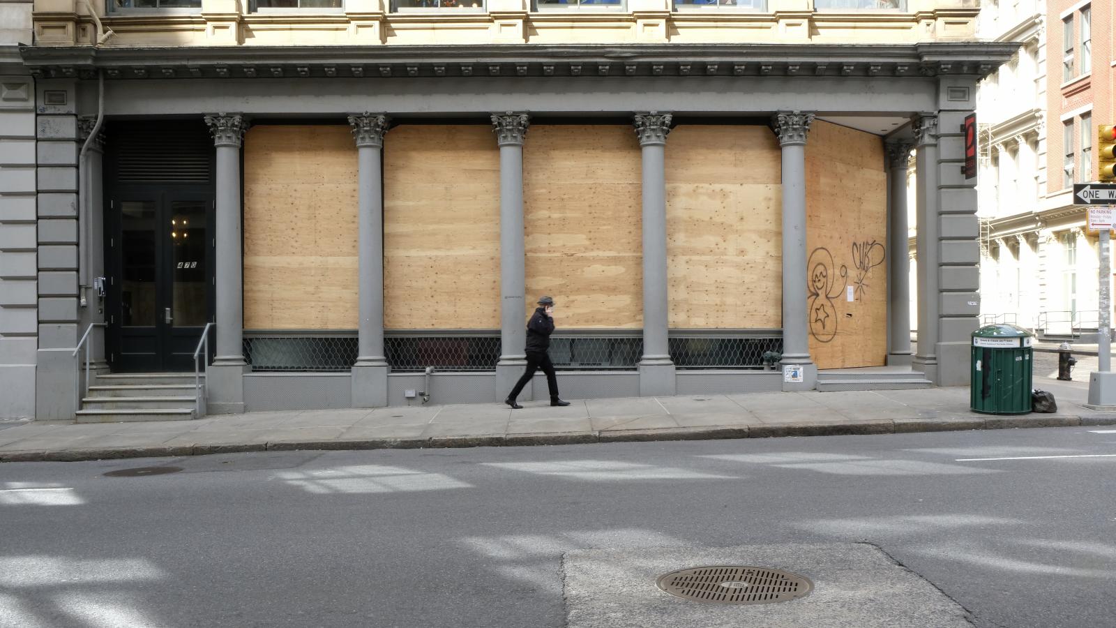 Photojournalism - New York - April 20, 2020 -- A bordered store is seen the...