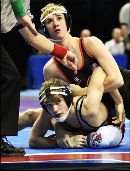 Sports - Sam Wilhelm of Knob Noster pins Noah Walters from Lawson...