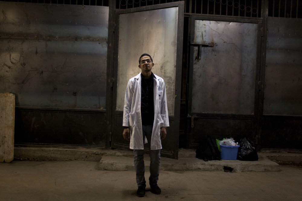 Prisoners of a Revolution - Dr. R, 28, a head doctor at makeshift hospitals during...