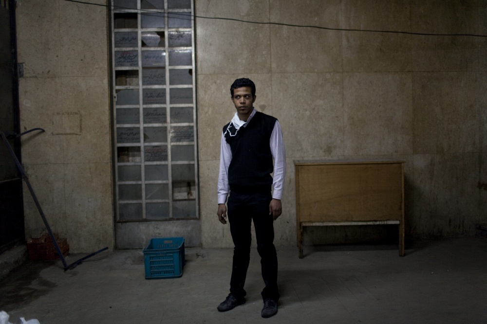 Prisoners of a Revolution - Issa, 23, arrested in downtown Cairo, early Dec. 2011,...