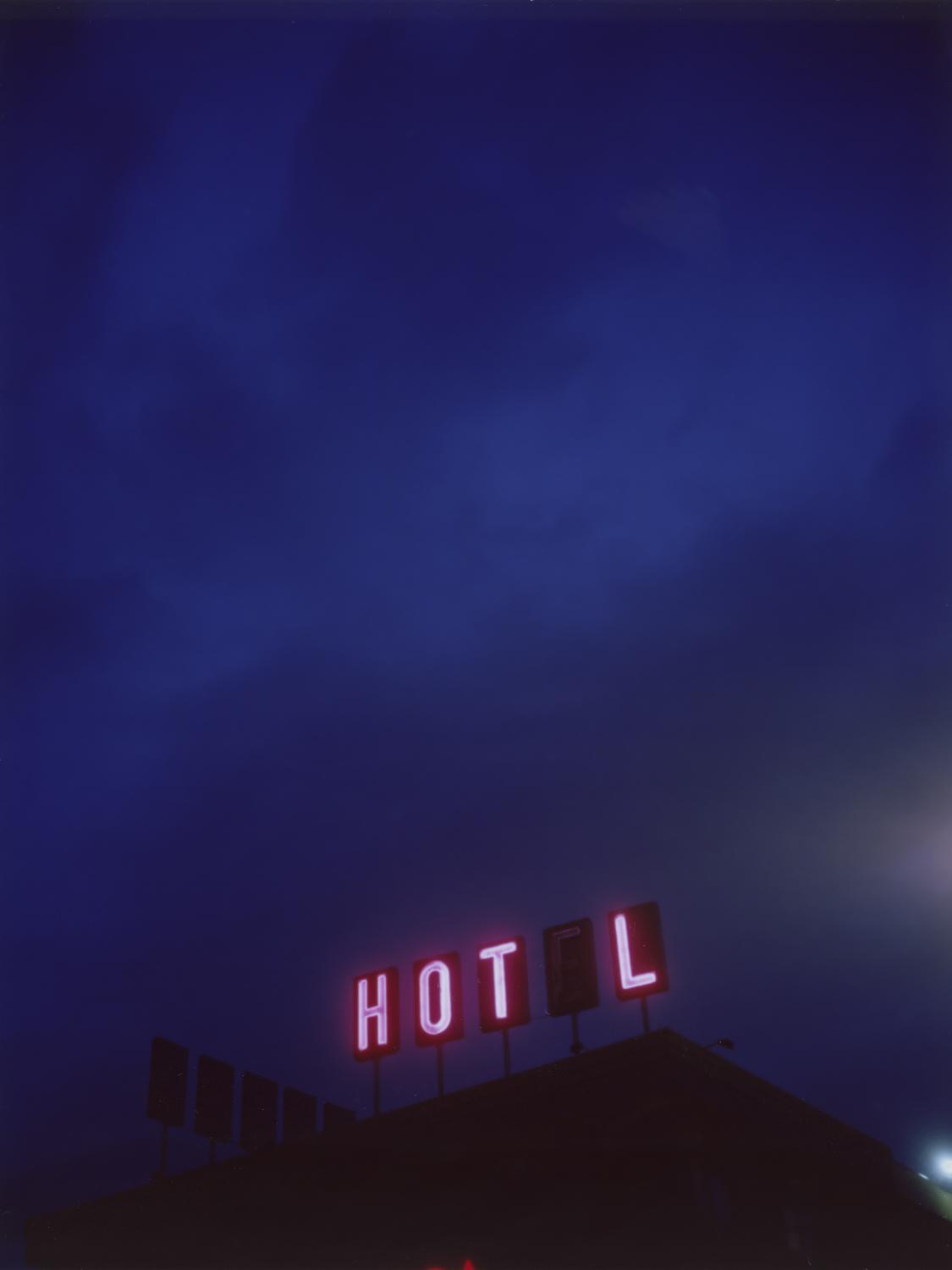 A road motel sign stands along the almost 50 miles of road that comprehends Colfax Avenue, in...