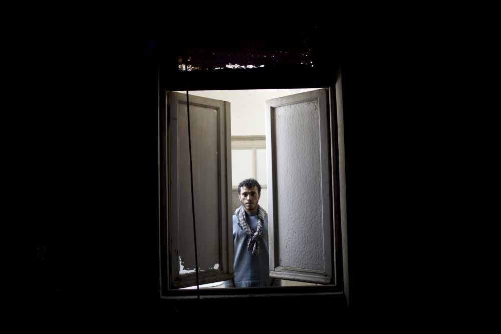 Prisoners of a Revolution - Karim, 22, from Sayeda Zainab, was arrested near Mohamed...