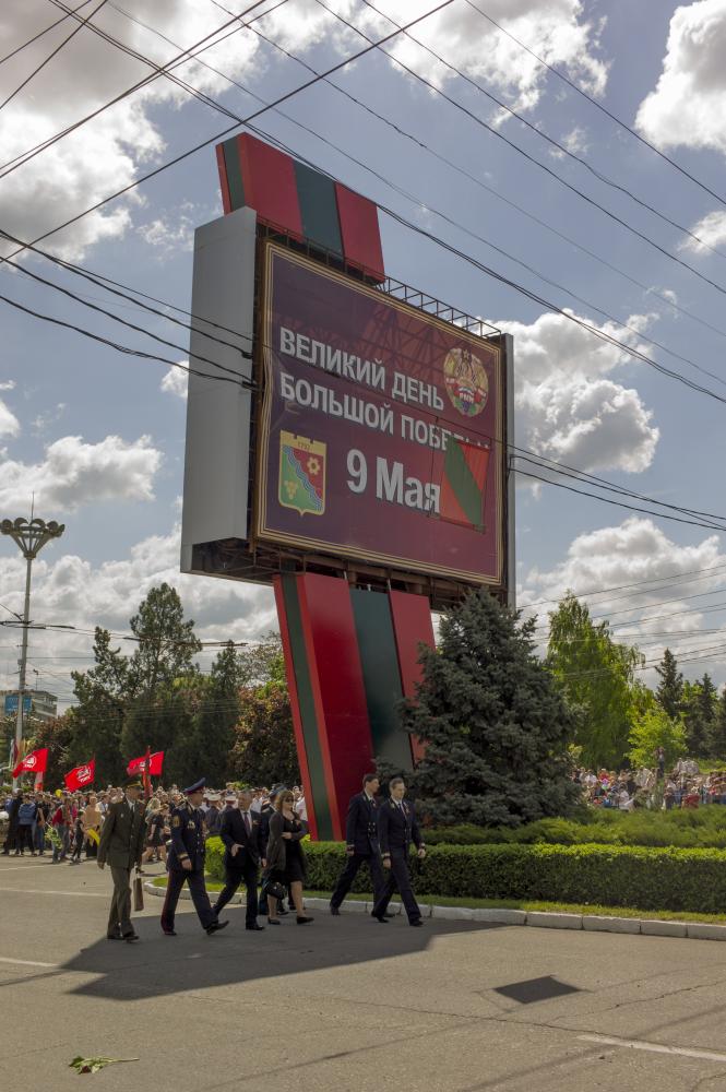 Image from Victory Day in Transnistria -  A board reads "Great day of the great Victory, 9th...