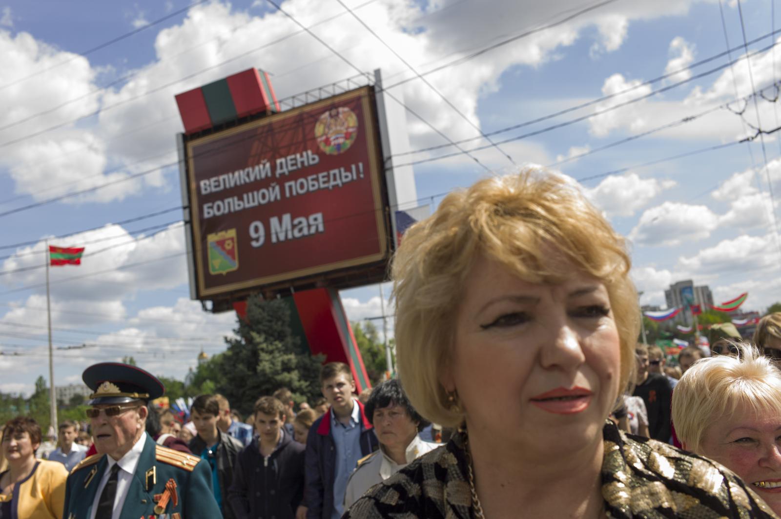 Image from Victory Day in Transnistria -  A sign reads "Great day of the great Victory, 9th...