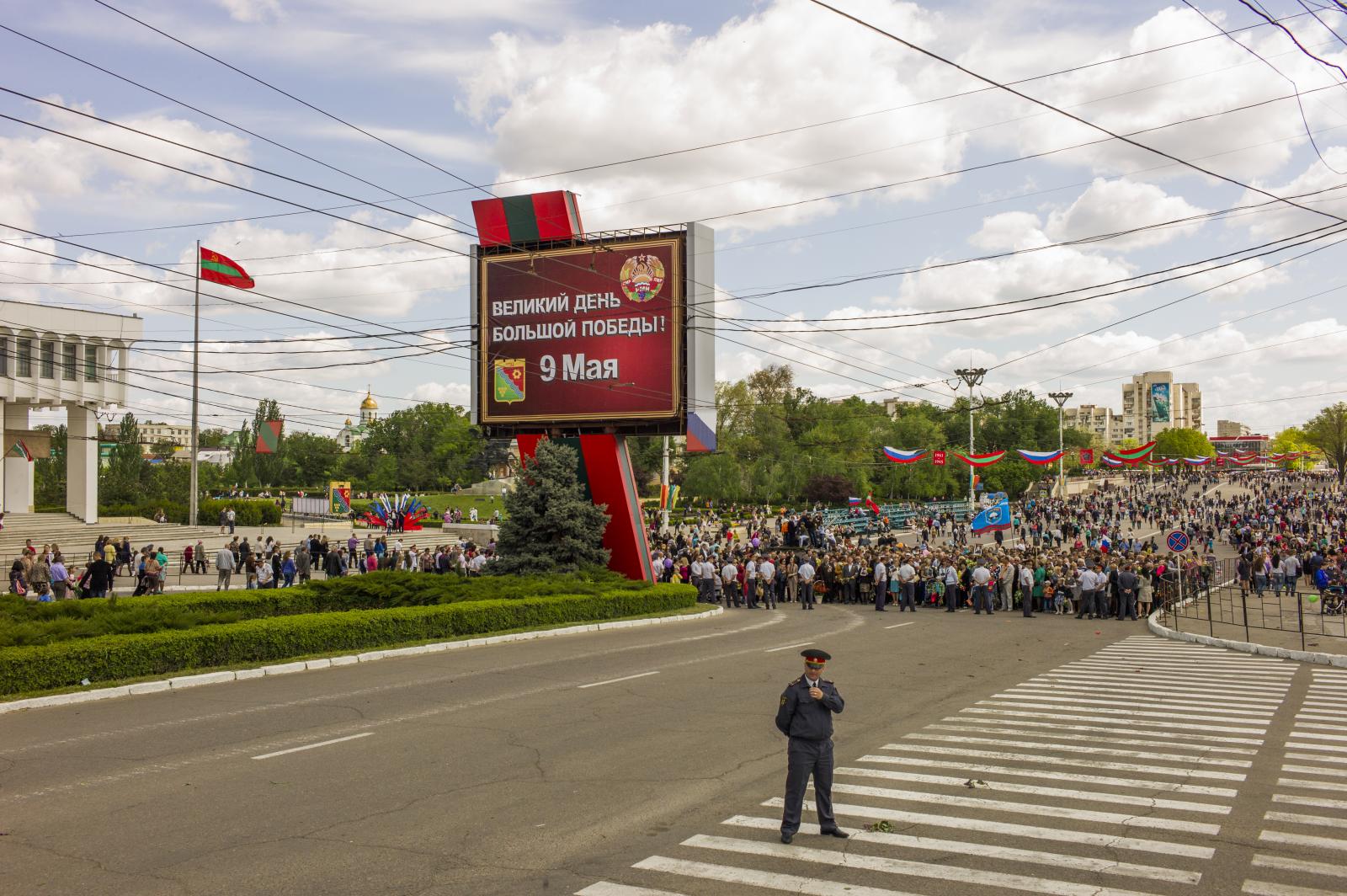 Image from Victory Day in Transnistria -  A board reads "Great day of the great Victory"...