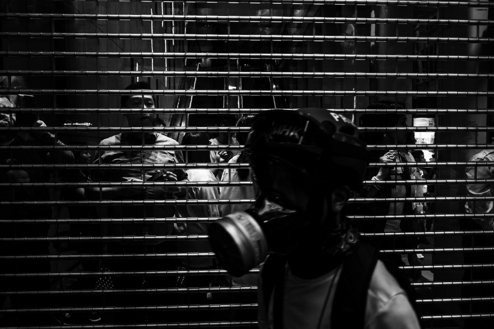 A man wears a mask to protect h... Central, Hong Kong, Nov. 2019.