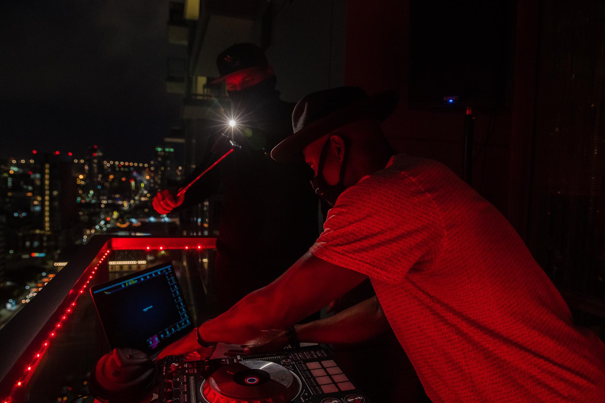A DJ Cheers Up Locals During a Pandemic - DJ IAMNOEL plays his set while a friend films it for a...