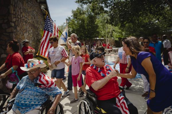 Congresswoman Veronica Escobar visits with veterans in El Paso, Texas during Fourth of July celebrations in 2019.