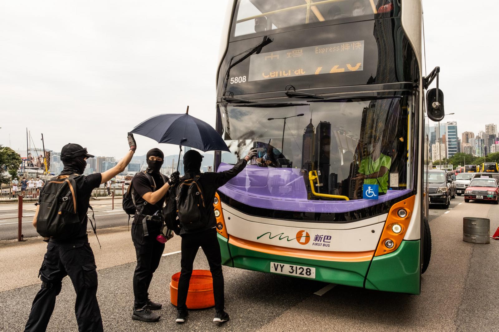 A group of protesters smeared t...g his ride. Hong Kong May 2020.